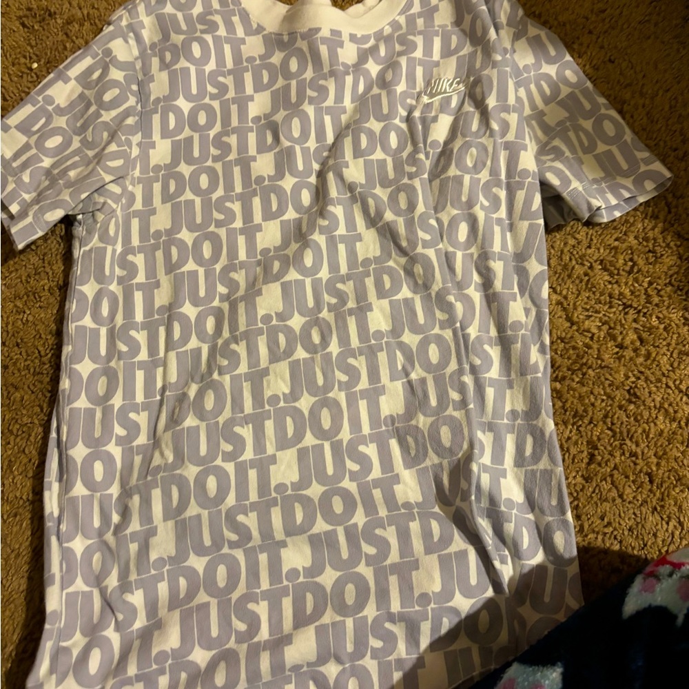 White and gray Nike shirt